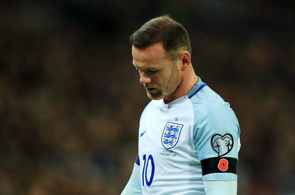  Wayne Rooney wears a Poppy black armband during the FIFA 2018 World Cup qualifying match between England and Scotland