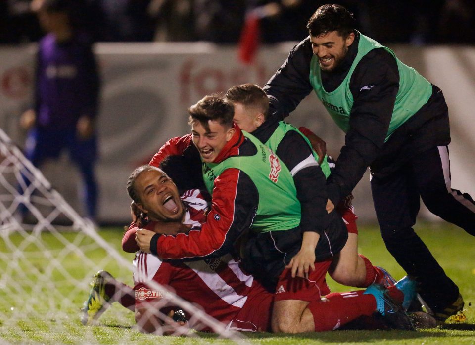  Luke Benbow celebrates with Stourbridge team mates after scoring against Whitehaw