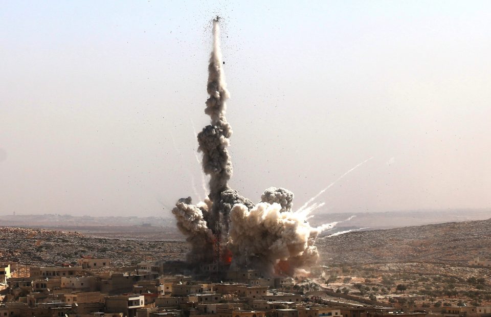  Smoke rises after a warcraft belonging to the Russian Army bombed a residential area in the Darat Izza neighborhood of Aleppo, Syria