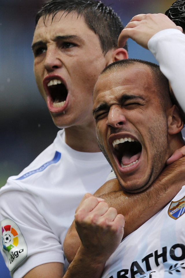  Malaga's Uruguayan forward Sandro Ramirez celebrates scoring for Malaga