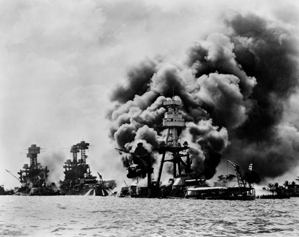 USS West Virginia and USS Tennessee, left, were damaged while the USS Arizona was sunk in the attack