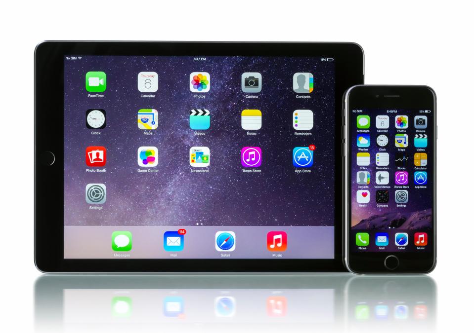  Apple Space Gray iPhone 6 and iPad Air, which are both powered by Apple's iOS software