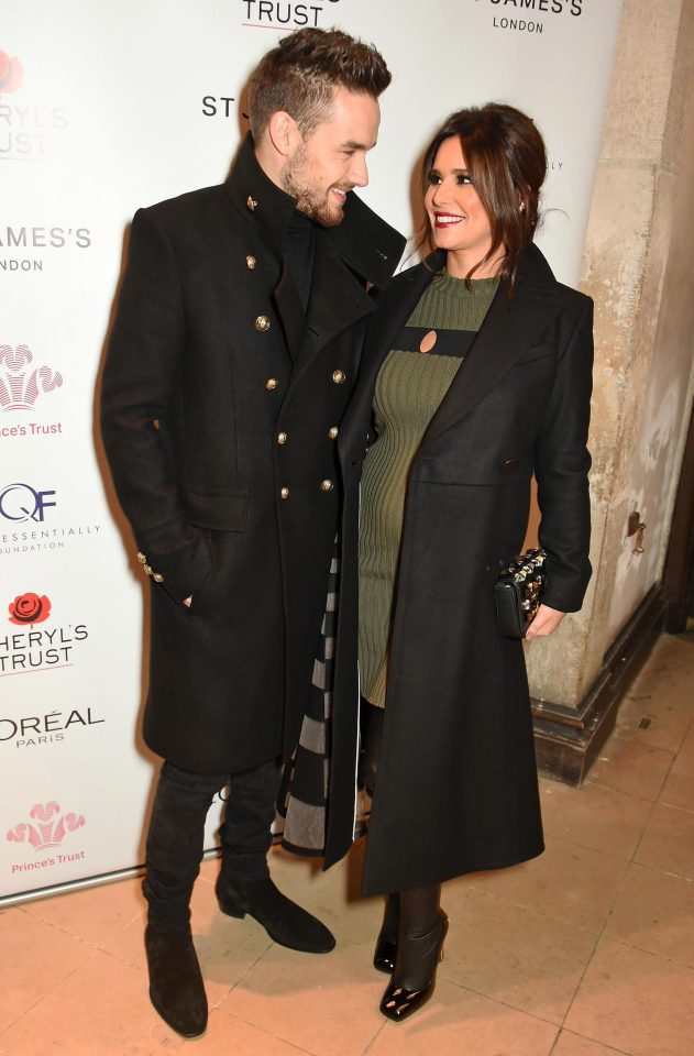  Cheryl and Liam smile happily at one another as she shows off her bump