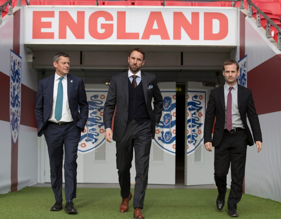 Glenn, Southgate and Dan Ashworth walk through Wembley