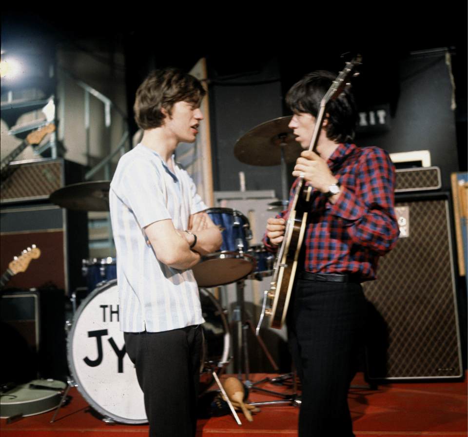  Jagger and Richards chat on the set of telly's Ready Steady Go! in 1964