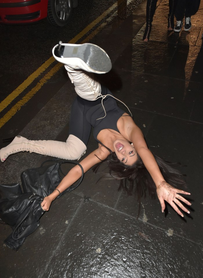  She appeared to bang her head on the pavement as she hit the floor