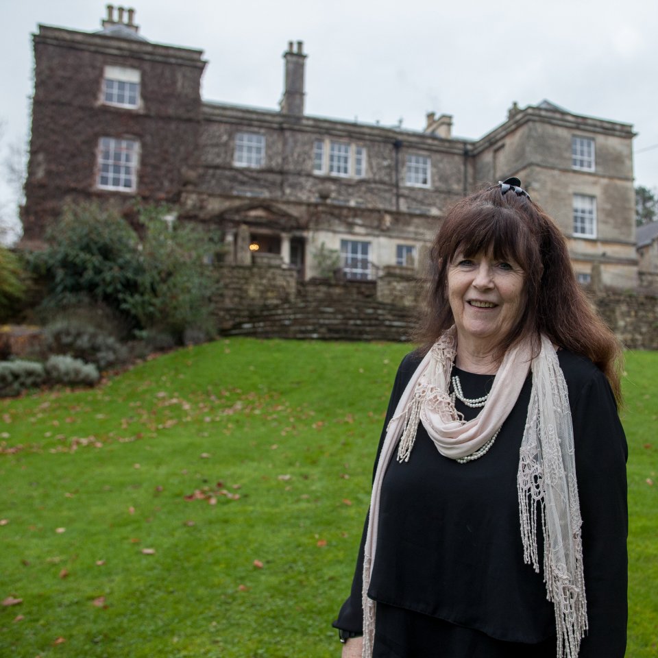 Kathleen Bremner stands in the same spot as her wedding photos, Burleigh Court Hotel, Stroud, Gloucestershire, after coming forward