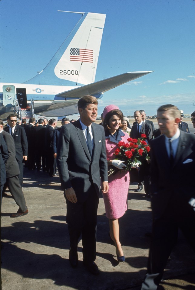 President John F Kennedy and wife Jackie leave Air Force One on the day he was assassinated 