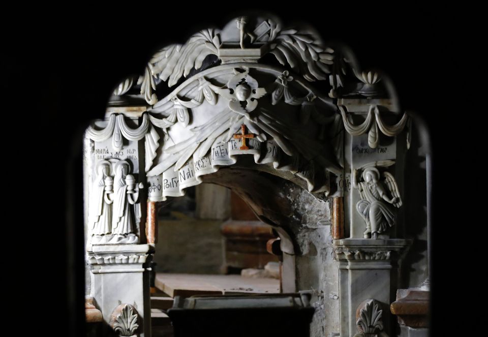 A picture shows the entrance of the Tomb of Jesus at the Church of the Holy Sepulchre under renovation in Jerusalem's