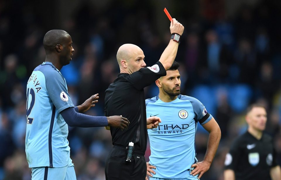  Sergio Aguero of Manchester City is shown a red card by referee Anthony Taylor 