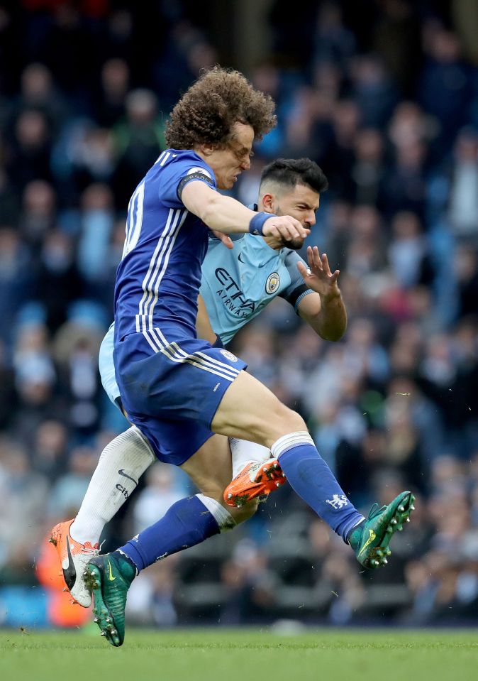 Sergio Aguero lunges in on David Luiz in a horror tackle 