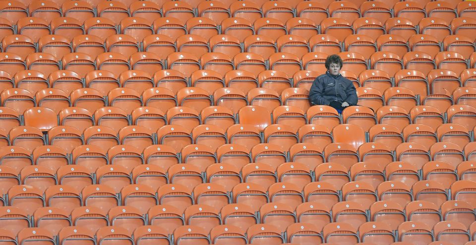 This fan had plenty of space to spread out at Bloomfield Road