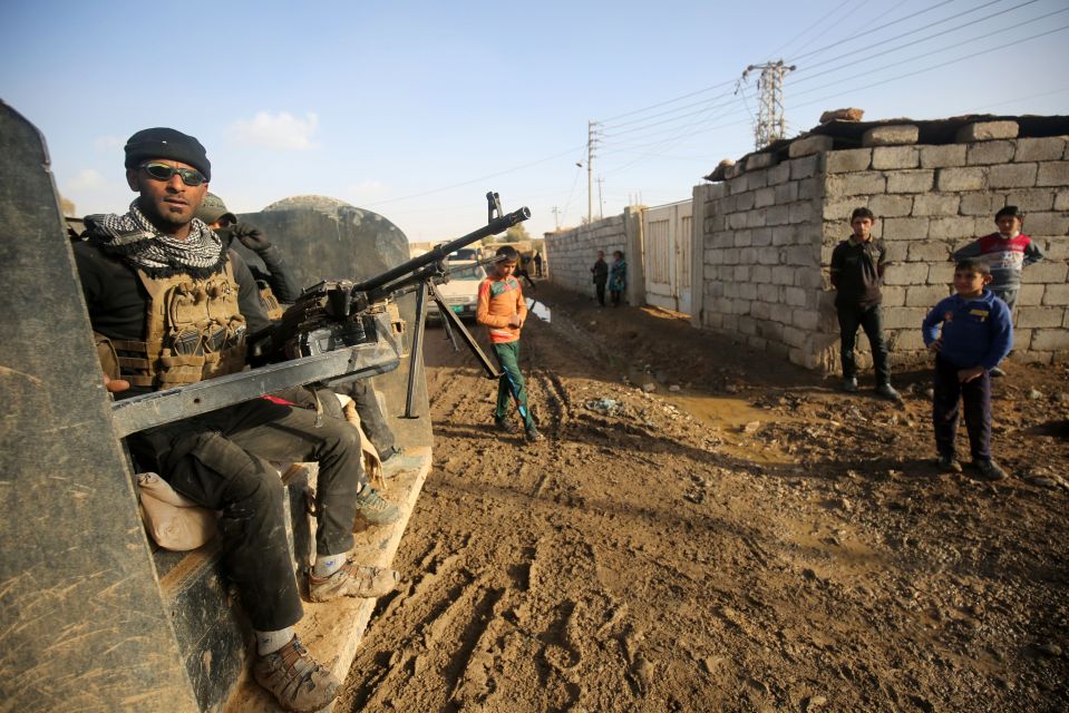  The fighting in Mosul continues to rage on with deadly SAS snipers playing their part in the battle and assisting Iraqi forces (pictured)