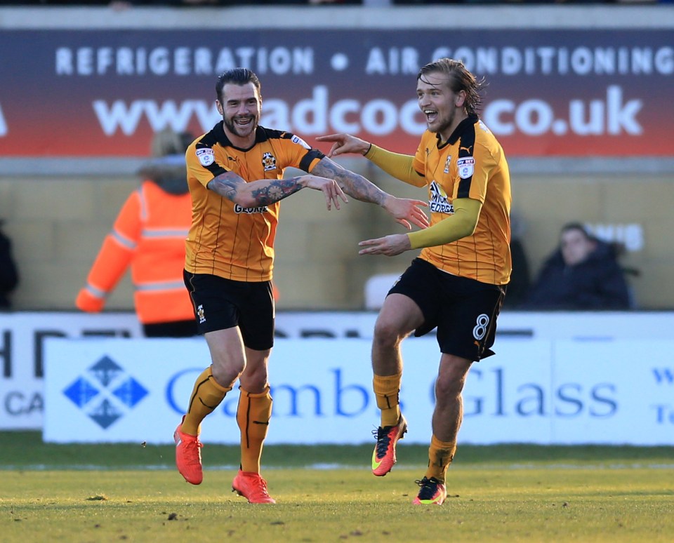 Luke Berry, right, celebrates after completing his hat-trick in Cambridge's 4-0 win against Coventry in the FA Cup