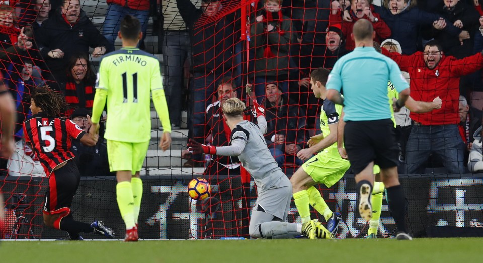  Nathan Ake scores the winner from a spill from Liverpool keeper Loris Karius