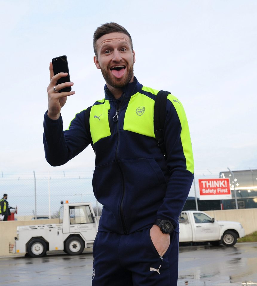  Shkodran Mustafi stuck his tongue before boarding the plane