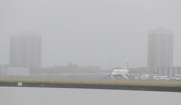 Half of flights out of London City Airport were cancelled this morning after the Capital awoke to a blanket of fog