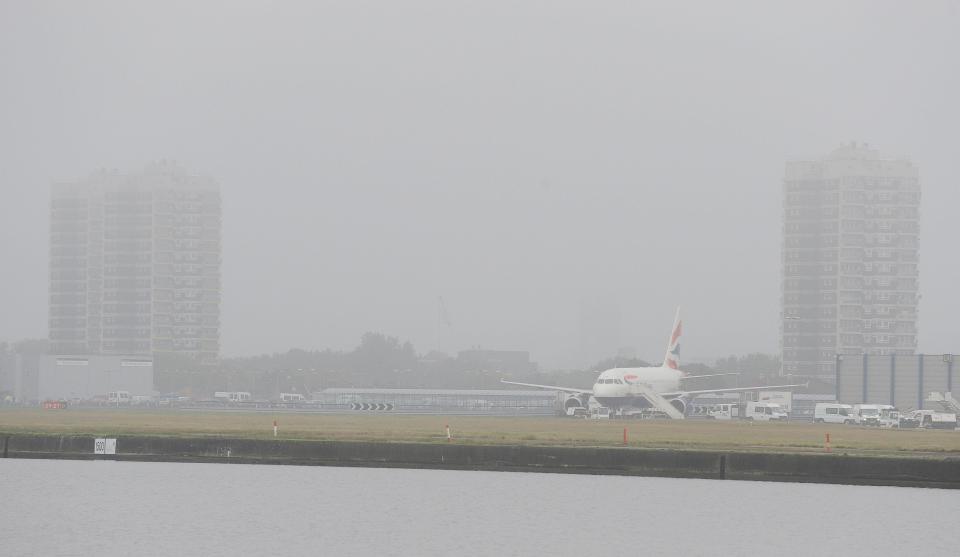 Thick fog has caused flights from London City Airport to be cancelled and delayed this morning