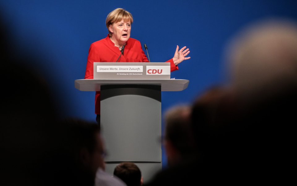  Angel Merkel speaks to CDU party delegates at conference in Essen