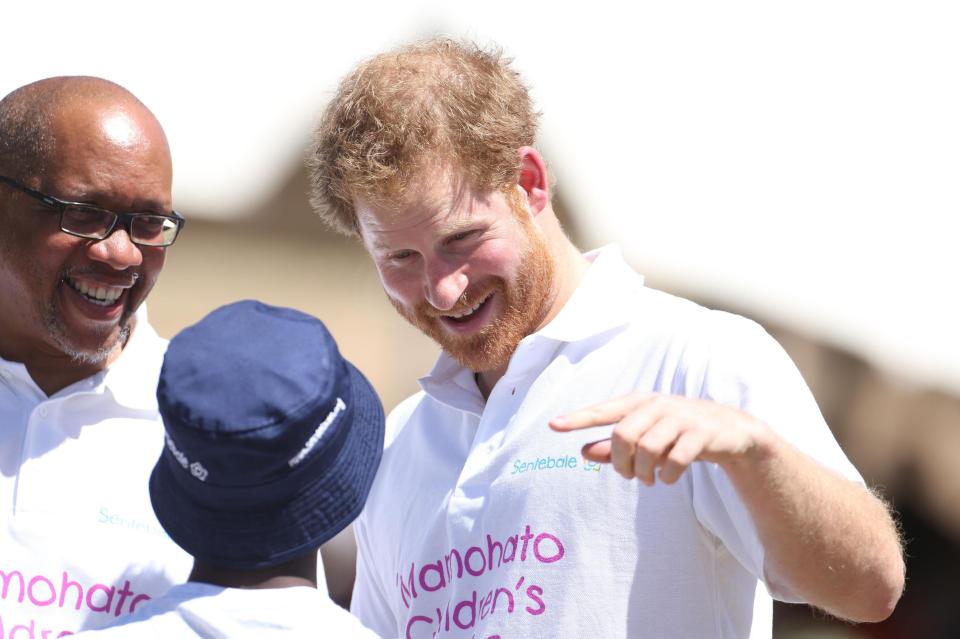 Prince Harry admits he has bonded with some of the orphans over losing their mothers at a young age