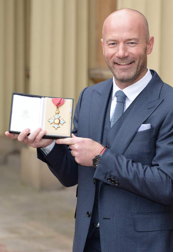 Bare we go . . . England football legend celebrates after receiving CBE