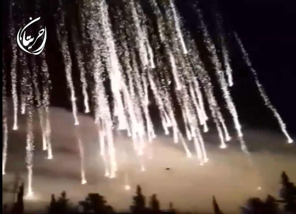  Fire bombs being dropped on Aleppo's Haritan