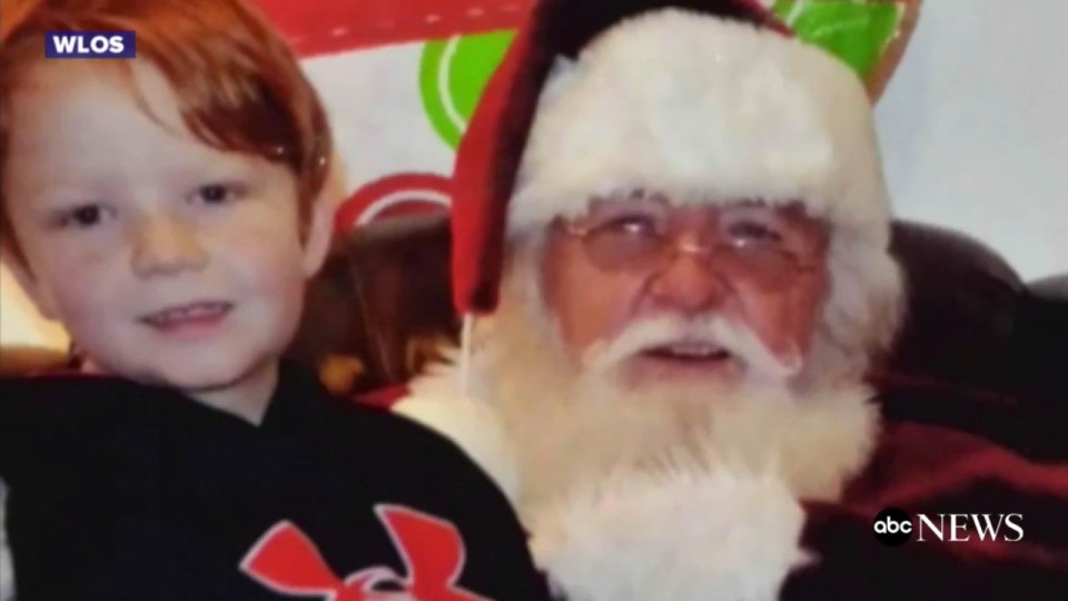 The unnamed Santa is pictured with Anthony's cousin 