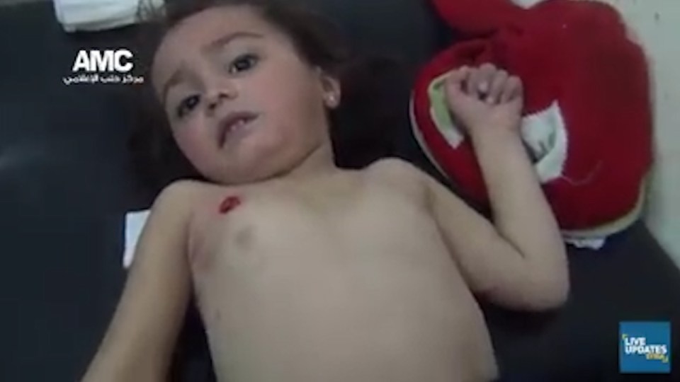  Horrific footage shows a little Syrian girl in tears after she was shot in the back by a regime sniper