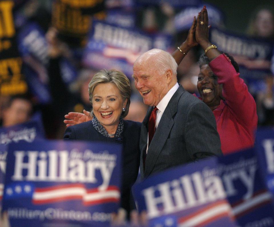  US Democratic presidential candidate Senator Hillary Clinton speaks with former Senator John Glenn in 2008