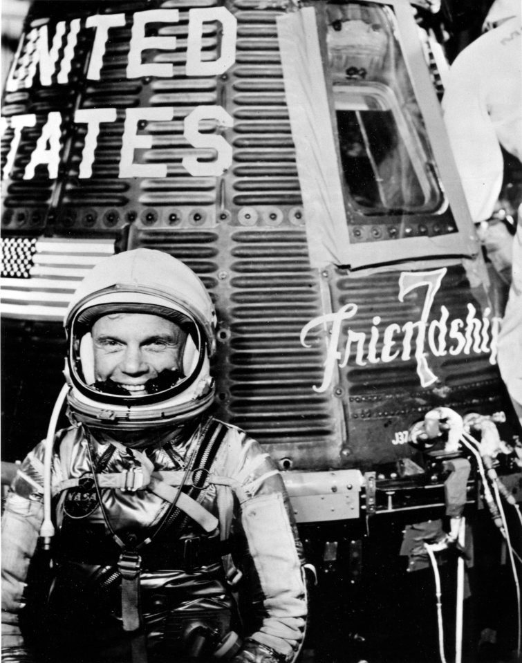  Glenn was the first American to orbit the earth in a 'Mercury' spaceship in 1962, pictured during pre-flight activities