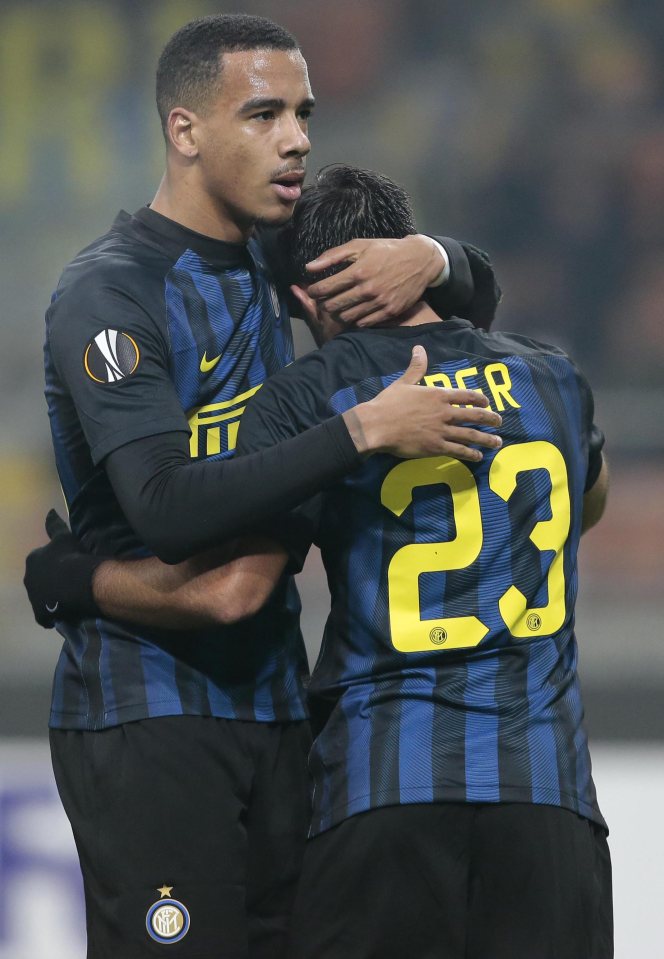  Milan's Eder celebrates after scoring with his teammate Senna Miangue