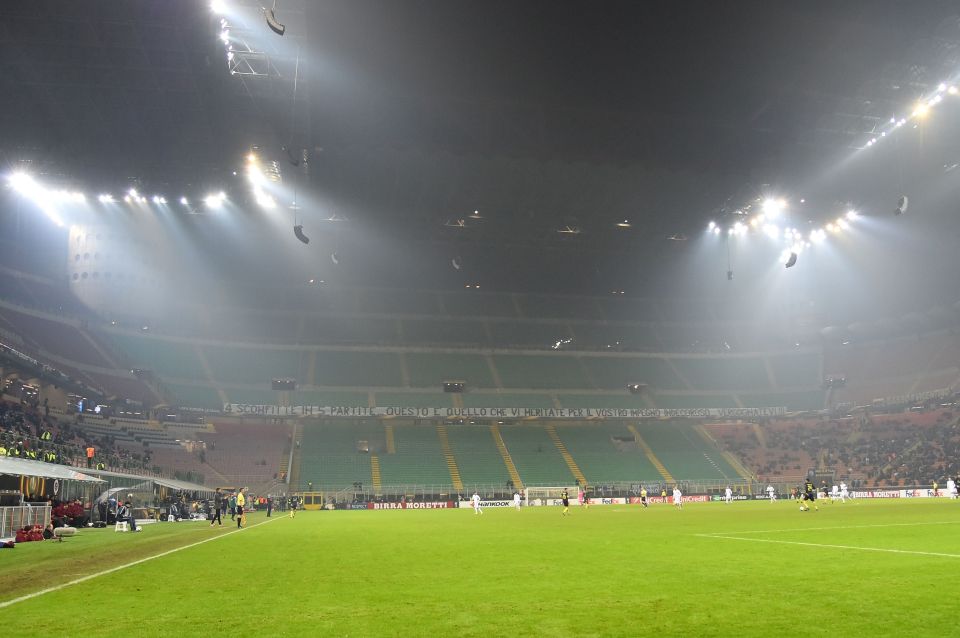  Inter Milan and Sparta Praha football teams play in front of an empty tribune with a banner reading "four defeats in five matches, this is what you deserved for your undignified dedication...shame on you"