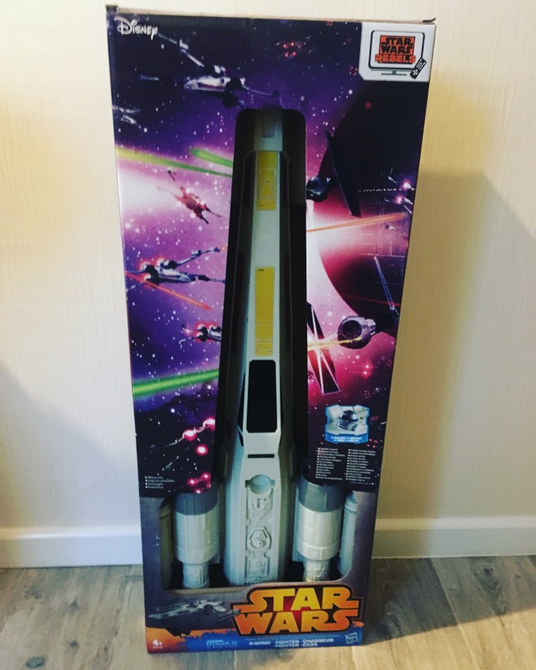 The mum-of-two has got her boys a host of goodies, including a Star Wars light saber 