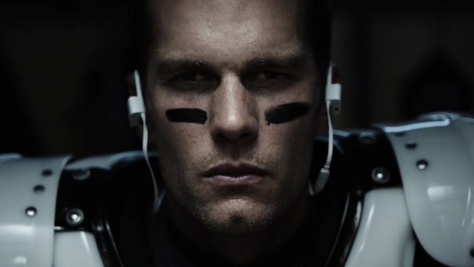 NFL legend Tom Brady looks menacing with his headphones