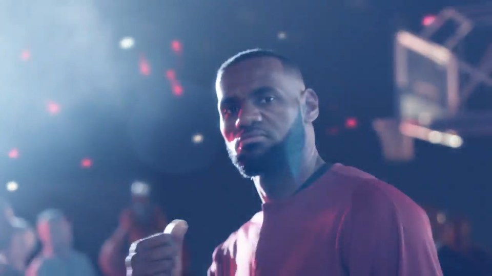 Basketball star LeBron James warms up with the headphones