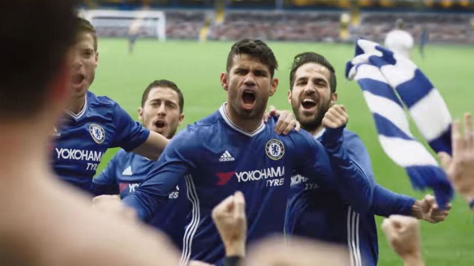 We see Chelsea players celebrate a goal with their fans - the Blues being an official partner