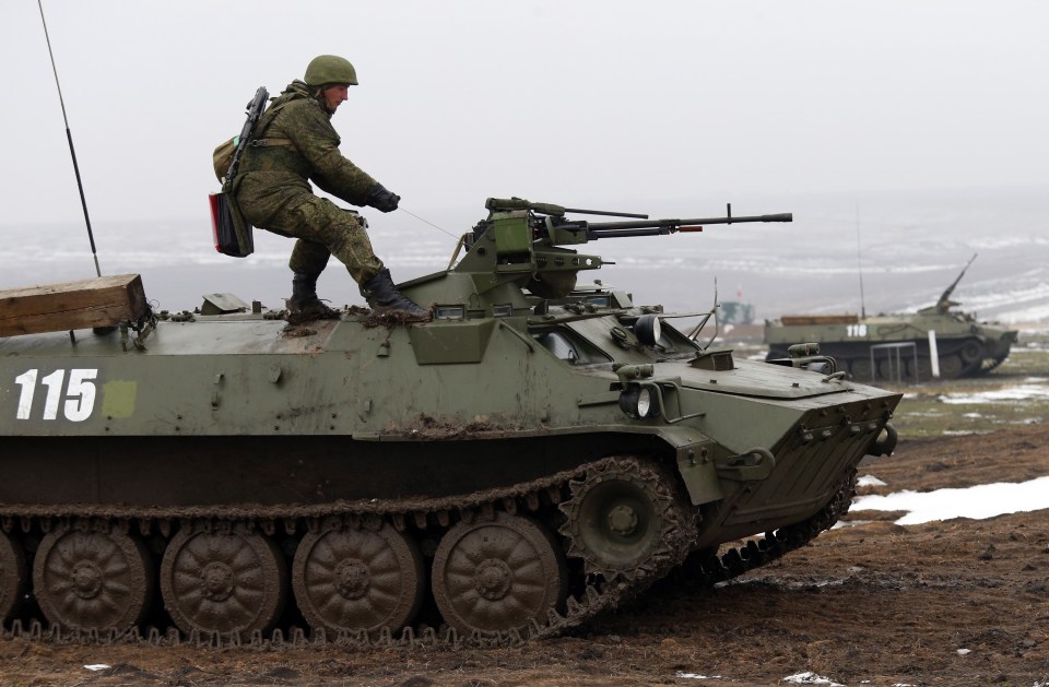  A lot of Russian hardware is 'Soviet inheritance'. Pictured, a Russian serviceman fires a machine gun during combat training exercises of the 150th Rifle Division earlier this month