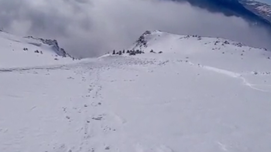  The skier was heading down a slope on Mount Lipallian in the Lake Louise Banff National Park, Alberta