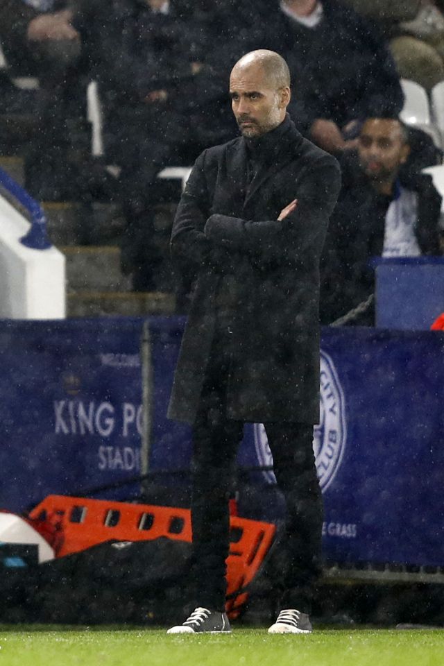 Pep Guardiola could only watch on in the rain