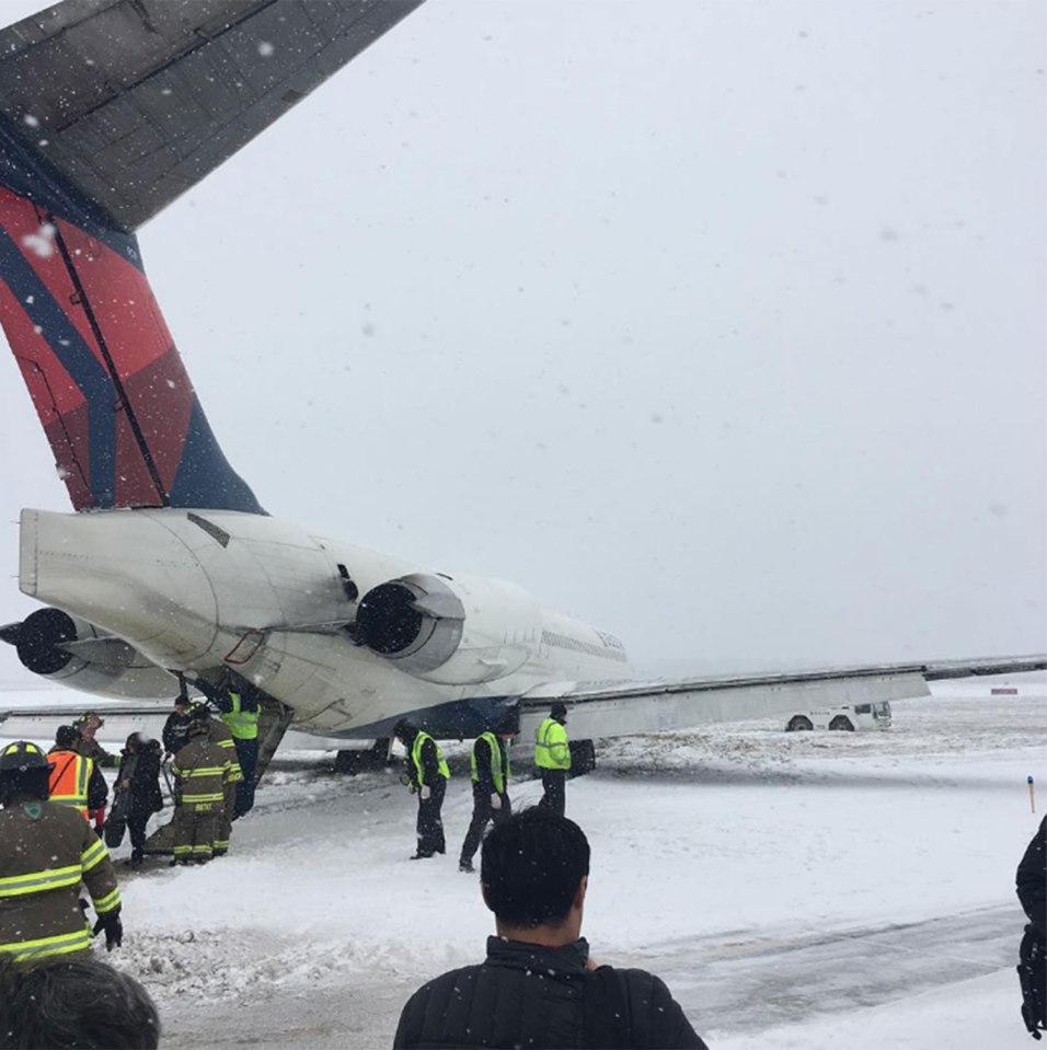  The 70 passengers and crew left the tail-end of the plane after it skidded onto grass