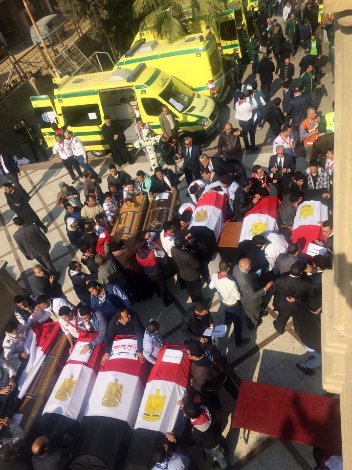  The coffins were draped in Egyptian flags before being loaded into waiting ambulances