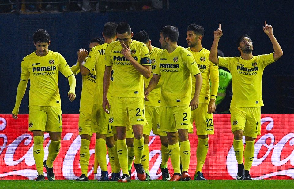 Villarreal players celebrate after the opening goal