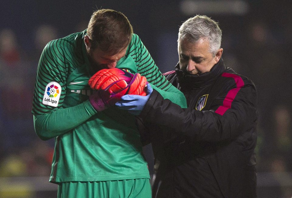 Atleticos Jan Oblak went off injured after his mistake