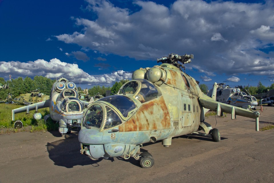  An attack helicopter left to rust at an abandoned Soviet-era Russian Air Force base