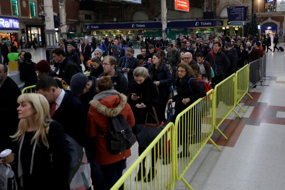  Passengers queuing up for an express train to Gatwick Airport which was running a reduced service as a result of a train strike