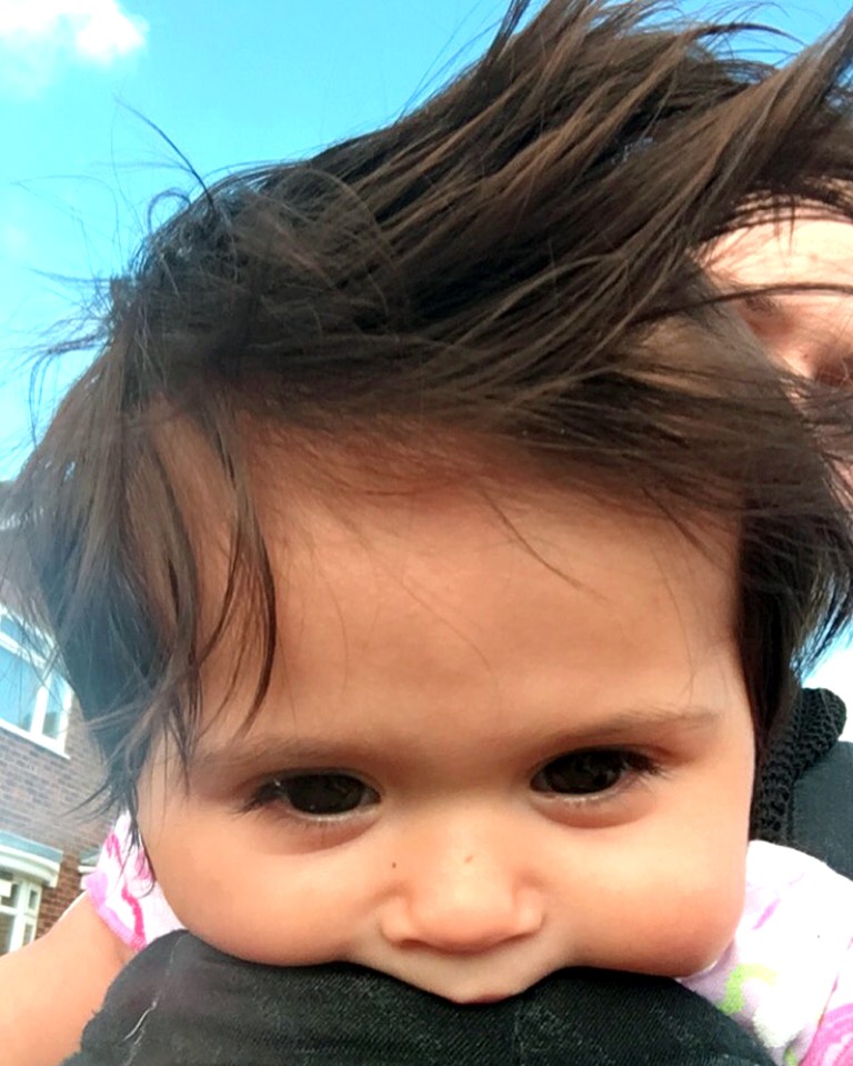  She has so much hair at such a young age her parents are regularly stopped in the street by strangers