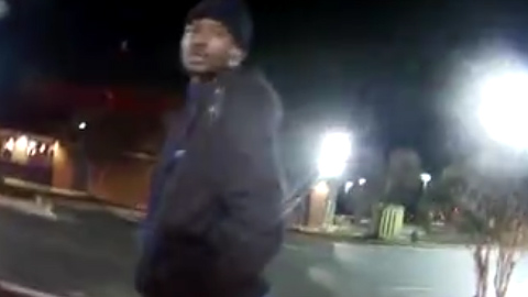  The officer is seen approaching a man who reportedly pulled out a handgun and shoots him