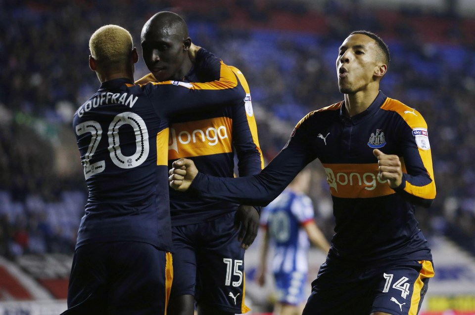 Diame celebrates a goal which helped fire Newcastle back to the top of the table