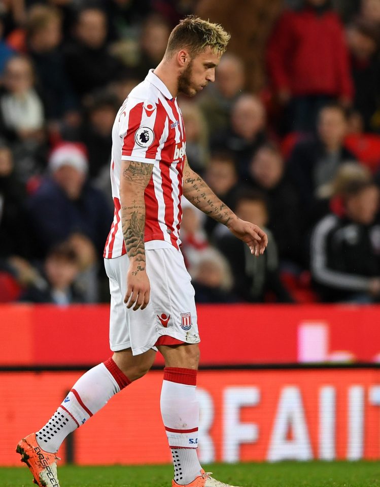 Marko Arnautovic of Stoke City walks off the pitch after shown the red card during the Premier League match between Stoke City and Southampton