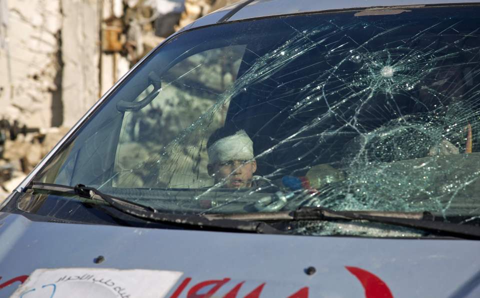  "The convoy was shot at by regime forces and we have three injured," an ambulance worker said